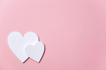 White hearts on a pastel pink background. Valentine's day, Mother's day background