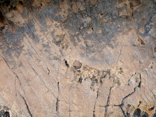 through erosion from wind and rain for several years