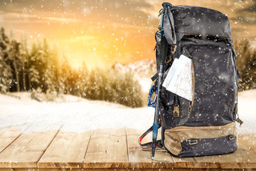 Winter backpack on desk and free space for your decoration 