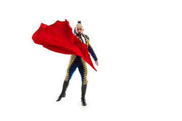 Torero in blue and gold suit or typical spanish bullfighter isolated over white studio background....
