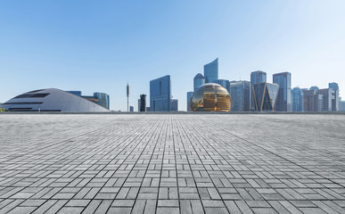 Panoramic skyline and buildings with empty concrete square floor，Qianjiang New Town，hangzhou,china