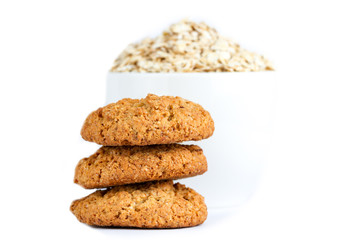 Isolated oatmeal cookies and cereals on a white background