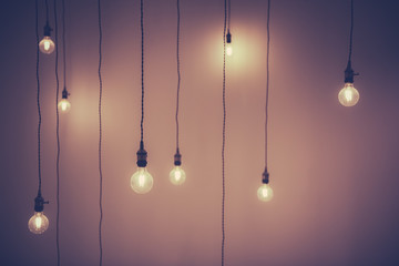 Group of Light Bulbs Wallpaper Background.