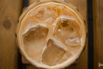  iced coffee on wooden table