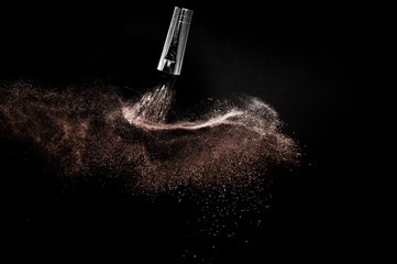 Cosmetic brush with living Coral Color  cosmetic powder spreading for makeup artist and graphic design in black background