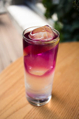  lavender lemonade with ice on the windowsill on a hot sunny day