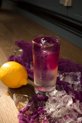  lavender lemonade with ice on the windowsill in a hot sunny day