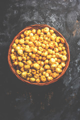 Roasted Phool Makhana or Crispy Lotus pops Seed served in a bowl, selective focus