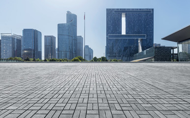 Panoramic skyline and buildings with empty concrete square floor，Qianjiang New Town，hangzhou,china