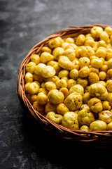 Roasted Phool Makhana or Crispy Lotus pops Seed served in a bowl, selective focus