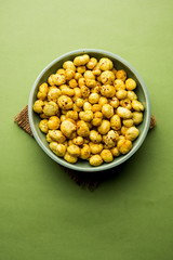 Roasted Phool Makhana or Crispy Lotus pops Seed served in a bowl, selective focus