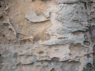 through erosion from wind and rain for several years