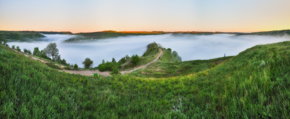 foggy spring morning. picturesque dawn. river canyon