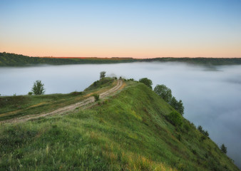 foggy spring morning. picturesque dawn. river canyon