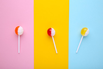Many lollipops on colorful background. sweet candy concept