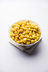 Roasted Phool Makhana or Crispy Lotus pops Seed served in a bowl, selective focus