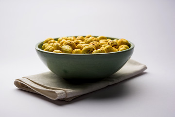 Roasted Phool Makhana or Crispy Lotus pops Seed served in a bowl, selective focus