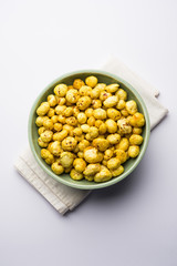 Roasted Phool Makhana or Crispy Lotus pops Seed served in a bowl, selective focus