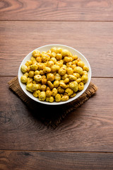 Roasted Phool Makhana or Crispy Lotus pops Seed served in a bowl, selective focus