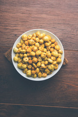 Roasted Phool Makhana or Crispy Lotus pops Seed served in a bowl, selective focus
