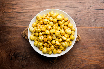 Roasted Phool Makhana or Crispy Lotus pops Seed served in a bowl, selective focus