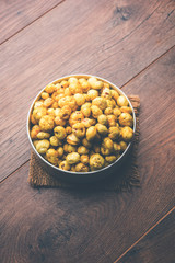 Roasted Phool Makhana or Crispy Lotus pops Seed served in a bowl, selective focus