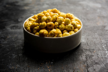 Roasted Phool Makhana or Crispy Lotus pops Seed served in a bowl, selective focus