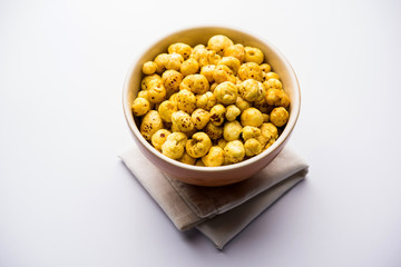 Roasted Phool Makhana or Crispy Lotus pops Seed served in a bowl, selective focus