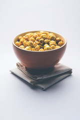 Roasted Phool Makhana or Crispy Lotus pops Seed served in a bowl, selective focus