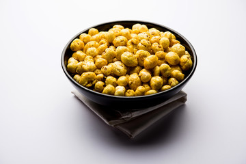 Roasted Phool Makhana or Crispy Lotus pops Seed served in a bowl, selective focus