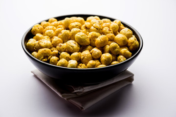 Roasted Phool Makhana or Crispy Lotus pops Seed served in a bowl, selective focus