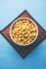Roasted Phool Makhana or Crispy Lotus pops Seed served in a bowl, selective focus