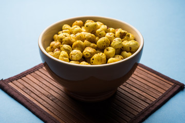 Roasted Phool Makhana or Crispy Lotus pops Seed served in a bowl, selective focus