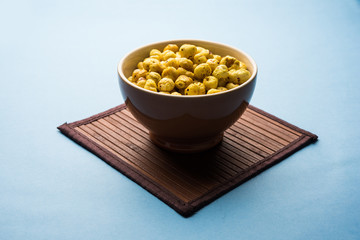 Roasted Phool Makhana or Crispy Lotus pops Seed served in a bowl, selective focus