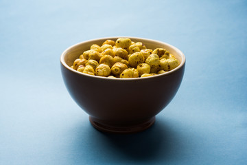 Roasted Phool Makhana or Crispy Lotus pops Seed served in a bowl, selective focus