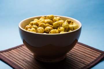 Roasted Phool Makhana or Crispy Lotus pops Seed served in a bowl, selective focus