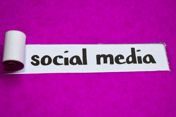 Social Media text, Inspiration, Motivation and business concept on purple torn paper