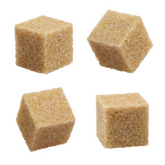 Set of brown sugar cubes, isolated on white background