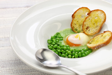 tear peas with poached egg, spanish basque cuisine
