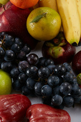 Closeup, a wide variety of fruits background
