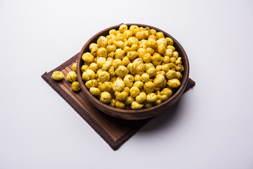 Roasted Phool Makhana or Crispy Lotus pops Seed served in a bowl, selective focus