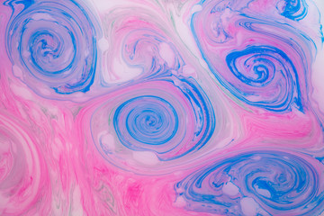 Abstract paint ink. Psychedelic background. Colorful spots on water surface.