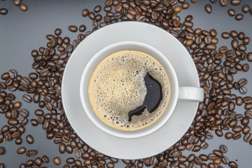 Top view. White cup of coffee on White background
