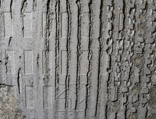 Obraz premium Concrete wall with remnants of glue for ceramic tiles. Texture