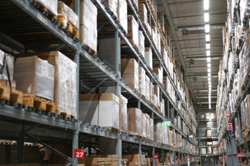 Background of warehouse or storehouse industrial and logistic company.Warehousing on the floor and called the high shelves