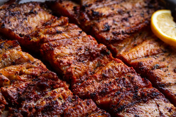 Fresh fish grilled texture. Grilled salmon with a slice of juicy lemon