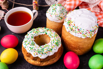 Easter, cake, eggs, holiday. Easter cake and colorful eggs on a dark background. It can be used as a background