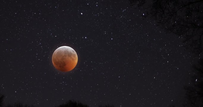 Blood moon and stars time lapse