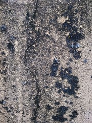 Texture old wall with plaster in dark spots