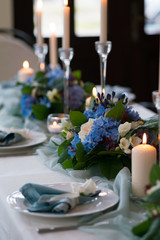decorated table in the restaurant for a wedding dinner